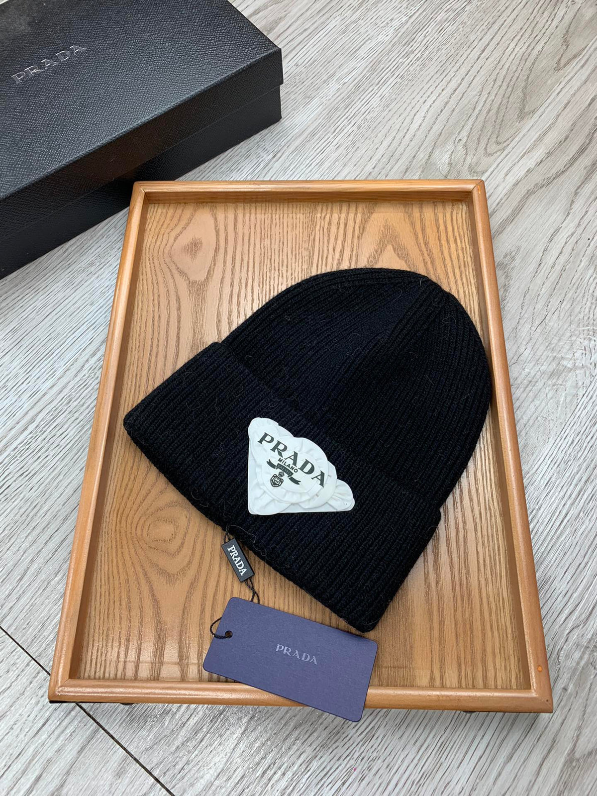 PRADA BEANIE HAT IN BLACK WOOL 431357