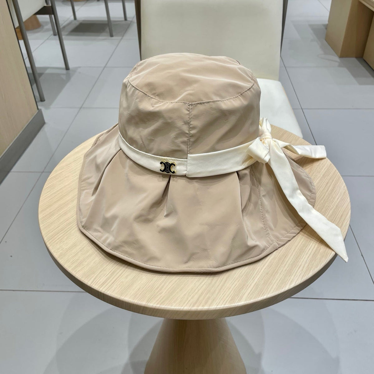 CELINE 25S BUCKET HAT 735018 IN NUDE